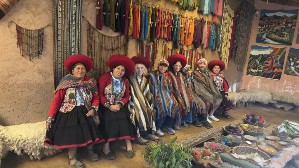 Chinchero weavers with travellers at a community weaving centre