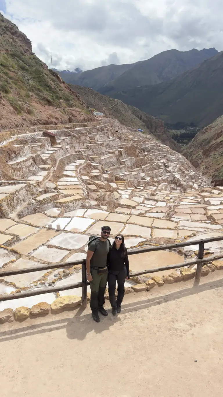 Couple at the viewpoint over the Maras Salt Mines pools
